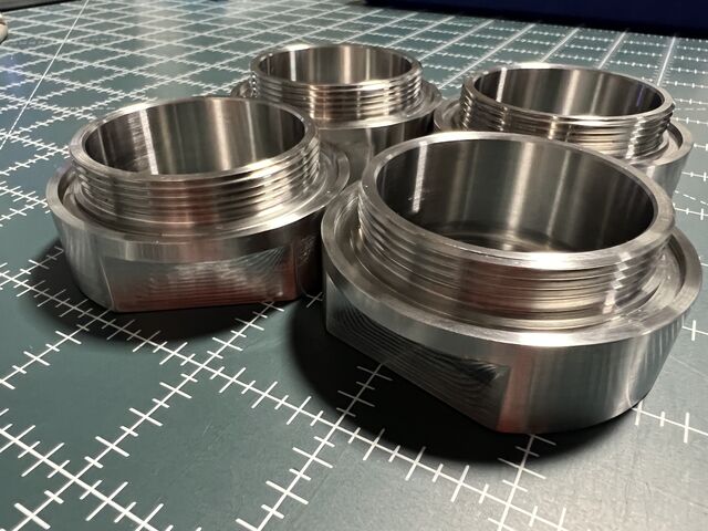Turned stainless bushings