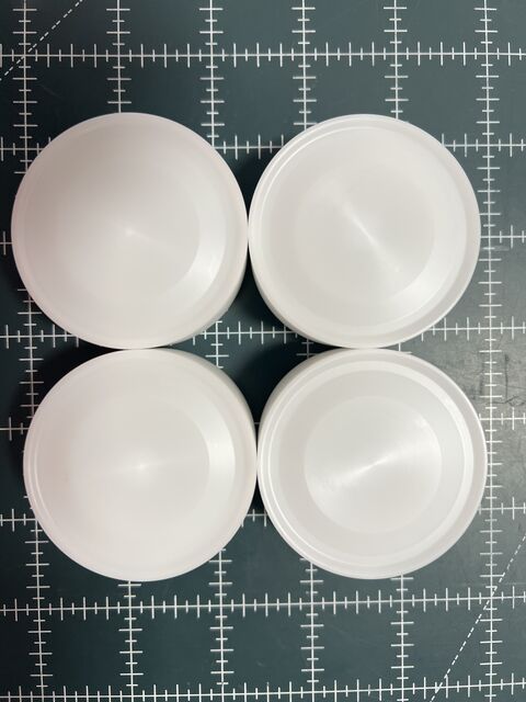 Turned plastic caps